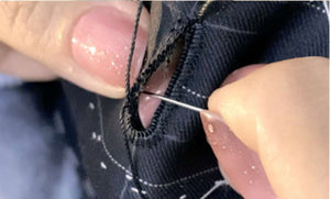 hand stitching part of jacket